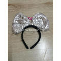 A headband with a big bow